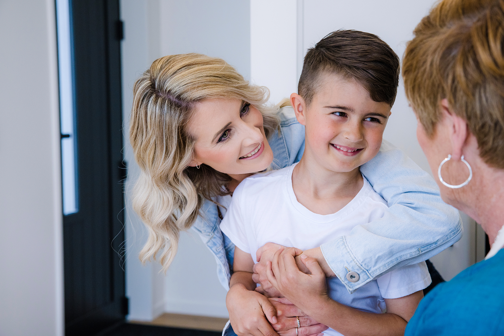 Daughter and grandson farewell grandmother.