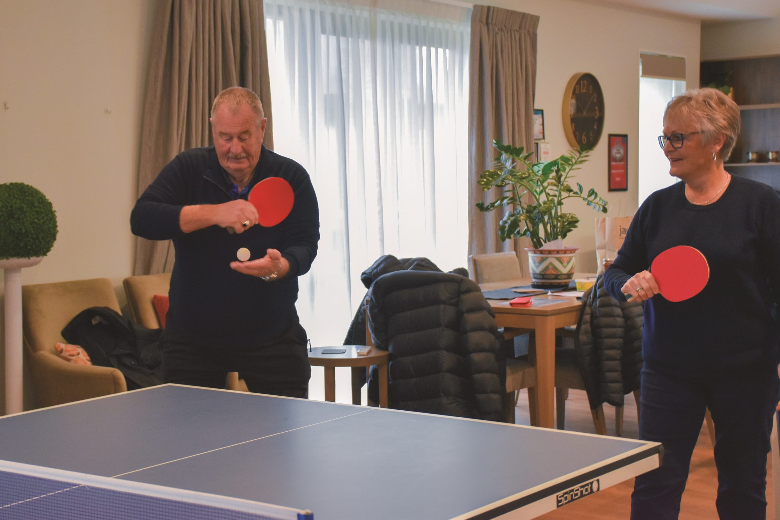 Larry and Jenny playing table tennis at The Sterling, Kaiapoi.